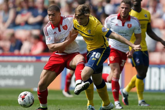 Charlie Goode tussles with Che Adams during his Scunthorpe United days, in an infamous game against Sheffield United during the Nigel Adkins era: Simon Bellis/Sportimage