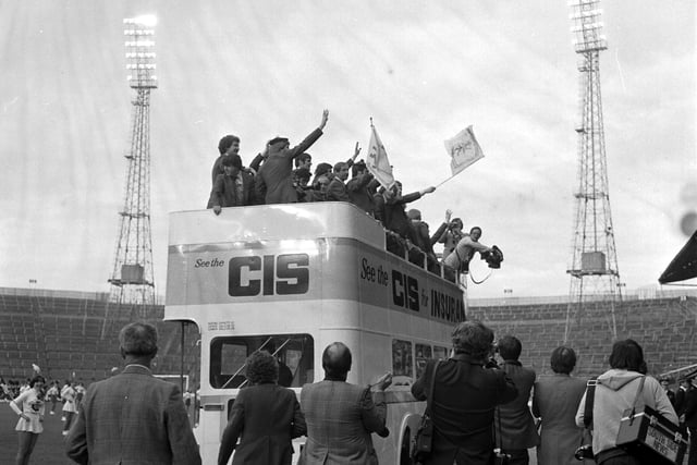 The Scotland World Cup squad wave to the football fans from the top of a bus at Hampden Park before they go to Argentina in May 1978.