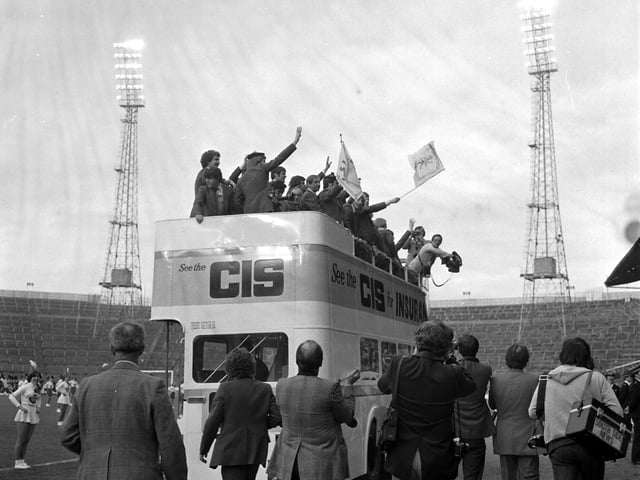 The Scotland World Cup squad wave to the football fans from the top of a bus at Hampden Park before they go to Argentina in May 1978.