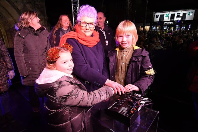 Dot Wright, 72, with her grand children Fearne Wright and Evan Wright, was among the NHS heroes asked to switch on Hartlepool's Christmas Lights in Church Square.