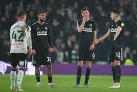 Jayden Bogle, Chris Basham and John Egan of Sheffield United look dejected after their team concede a goal to make it 2-0 during the Sky Bet Championship match at Pride Park Stadium, Derby. Picture credit should read: Simon Bellis / Sportimage