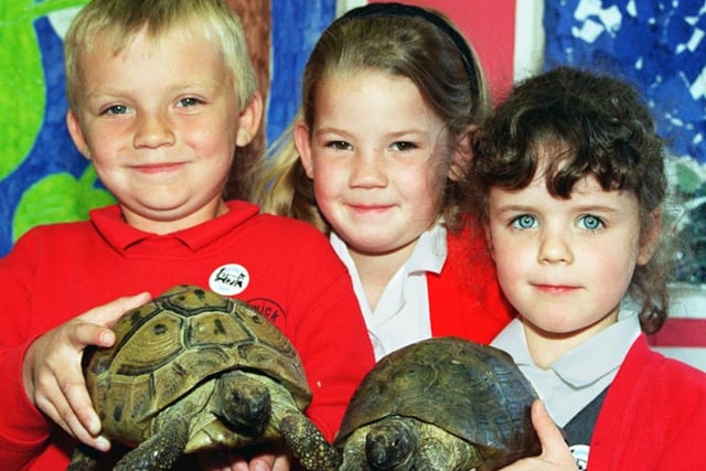 Adwick Washington School pupils, Craig Richarson, Kerry Ward and Cath Pearson with new friends back in 1997