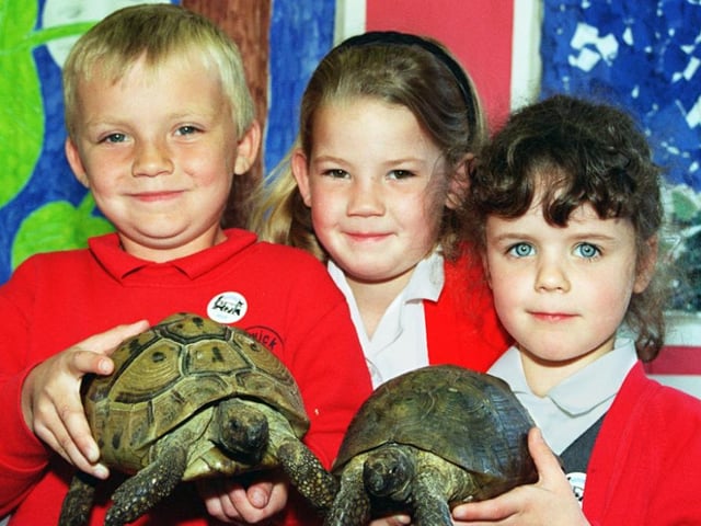 Adwick Washington School pupils, Craig Richarson, Kerry Ward and Cath Pearson with new friends back in 1997