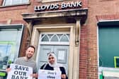Councillors Ben Miskell and Nabeela Mowlana of Park and Arbourthorne ward protesting at the decision by Lloyds Bank to close its branch on City Road, Intake, Sheffield. They say it is the last bank serving their community