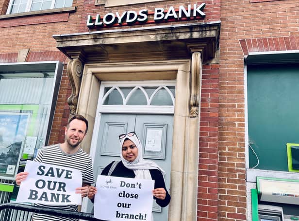 Councillors Ben Miskell and Nabeela Mowlana of Park and Arbourthorne ward protesting at the decision by Lloyds Bank to close its branch on City Road, Intake, Sheffield. They say it is the last bank serving their community
