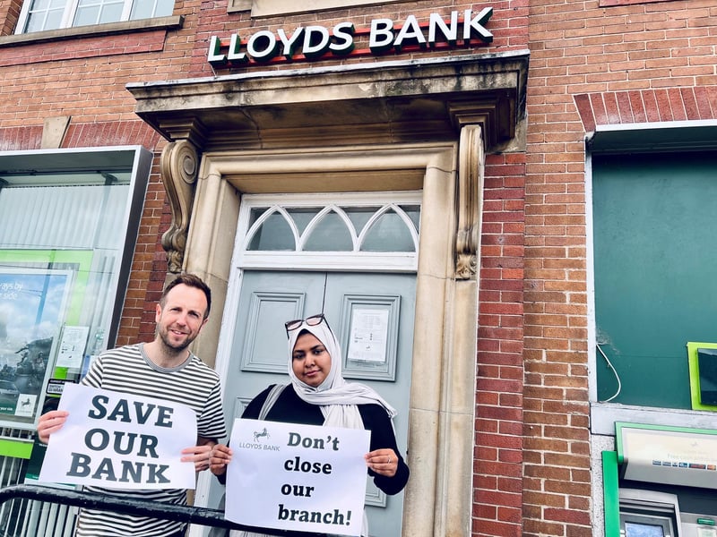 Councillors Ben Miskell and Nabeela Mowlana of Park and Arbourthorne ward protesting at the decision by Lloyds Bank to close its branch on City Road, Intake, Sheffield. At the time they said that it is the last bank serving their community... the bank closed anyway.