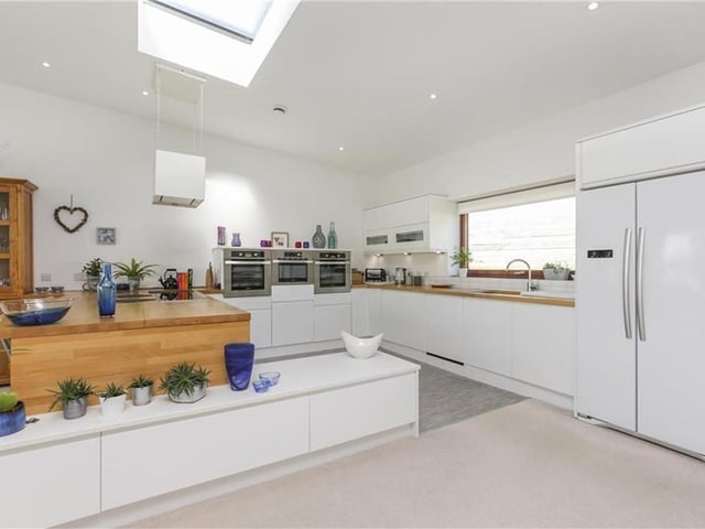 Brand new high tech kitchen. Yes please.