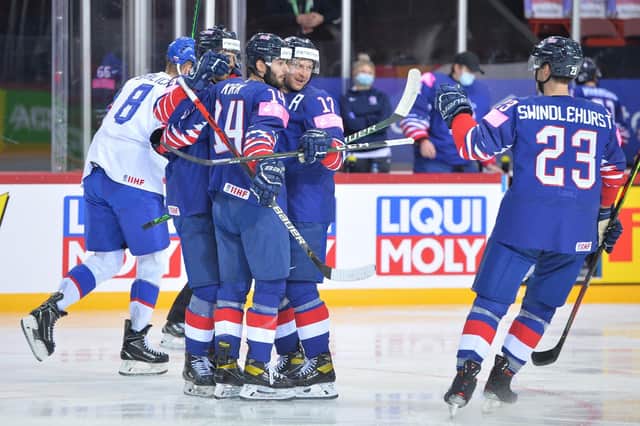 GB's Liam Kirk congratulated after scoring v Slovakia  at the Olympic Sports Centre in Riga.  Pic by Dean Woolley
