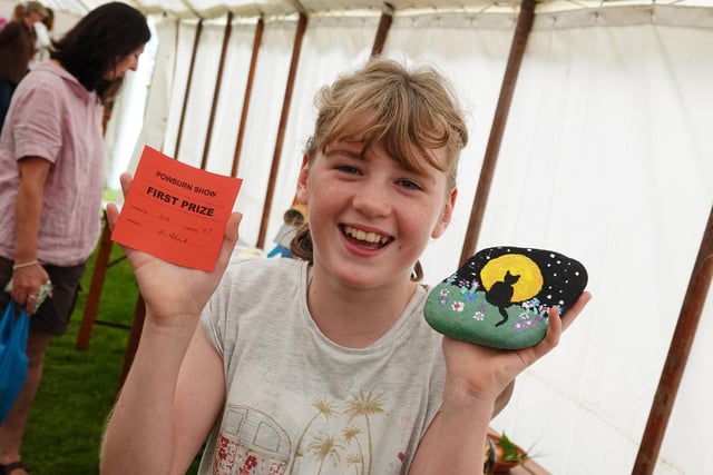 Kira Mole from Beanley with her winning decorated stone at  Powburn Show 2019.