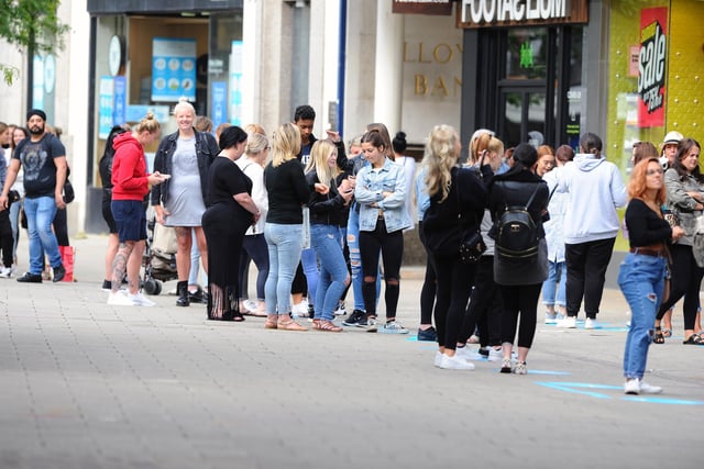 Queuing for Primark in Commercial Road, Portsmouth. Picture: Sarah Standing (150620-4125)