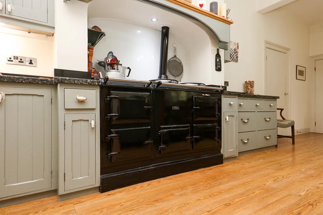 The generous living/kitchen area has granite worktops and an Aga Stove.