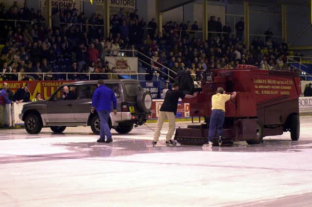 The Zamboni is towed off the ice after fluid leaking from it led to the cancellation of the ice hockey game (Pic: Fife Free Press)