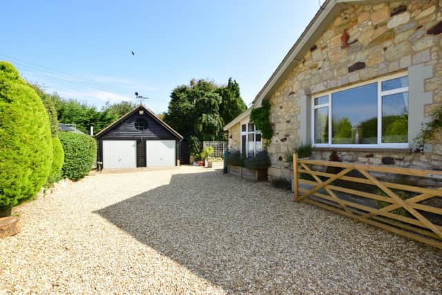 This four bedroom converted barn in Totland Bay, Isle of Wight, is on the market for £1.1m. It is listed by Fine and Country.