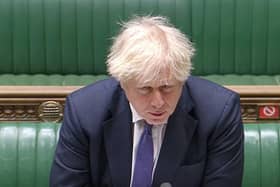 Prime Minister Boris Johnson speaking in the House of Commons in London as MPs, who have been recalled from their Christmas break, debated the latest coronavirus restrictions.