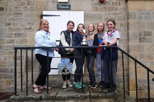Congratulations to 204th Sheffield Guides who were the worthy winners of the 2021 Yates Trophy, pictured here receiving the trophy from County Commissioner Wendy Howard.