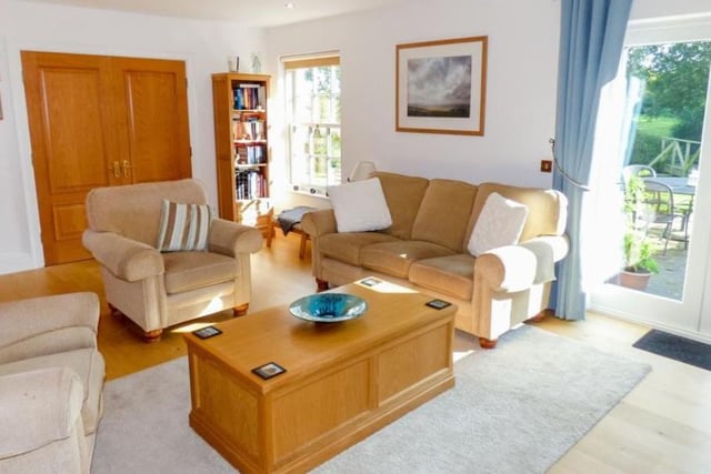 A light and spacious lounge overlooking the garden.

Picture: Right Move
