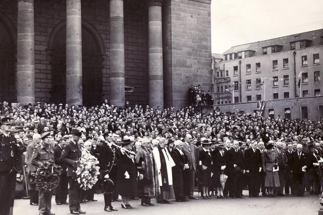 Civic heads of Sheffield gathered in front of the City Hall for a service of thanksgiving for victory. The Lord Mayor and Lady Mayoress (Coun and Mrs G E Marlow) laid wreaths on the war memorial