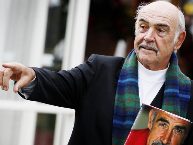 Scottish screen legend Sir Sean Connery poses for photographers as he promotes his new book, called 'Being a Scot' at the Edinburgh International Book Festival, in Charlotte Square gardens, in Edinburgh, on August 25, 2008.