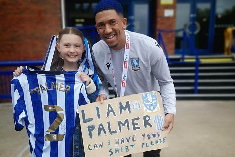 Wednesday player Liam Palmer gave a young fan his shirt after spotting her sign at the League One play-off final at Wembley Stadium.