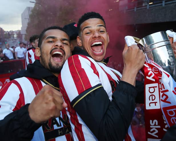 lliman Ndiaye (left) celebrates promotion with Sheffield United: Paul Thomas /Sportimage