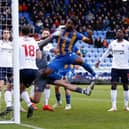 SHREWSBURY, ENGLAND - DECEMBER 10: Chey Dunkley of Shrewsbury Town celebrates after scoring a goal to make it 3-2 during the Sky Bet League One between Shrewsbury Town and Bolton Wanderers at Montgomery Waters Meadow on December 10, 2022 in Shrewsbury, United Kingdom. (Photo by James Baylis - AMA/Getty Images)