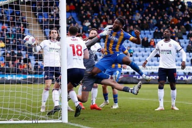 SHREWSBURY, ENGLAND - DECEMBER 10: Chey Dunkley of Shrewsbury Town celebrates after scoring a goal to make it 3-2 during the Sky Bet League One between Shrewsbury Town and Bolton Wanderers at Montgomery Waters Meadow on December 10, 2022 in Shrewsbury, United Kingdom. (Photo by James Baylis - AMA/Getty Images)