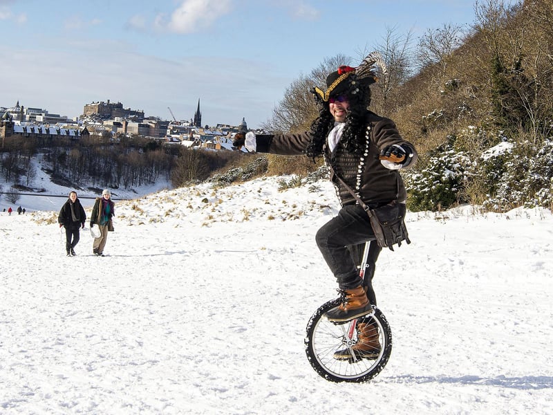 Marco Marangon dressed as a pirate while on his uni-cycle.