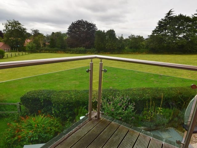 Here is that balcony view from the master bedroom. If relaxing here doesn't relieve the stress and tension of a day's work, nothing will!