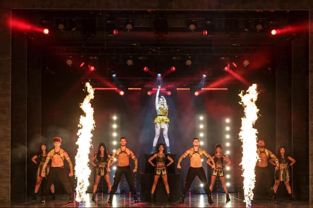 Emily Williams as Rachel Marron and Company in The Bodyguard the Musical