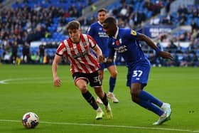 Sheffield United's Oliver Arblaster (left) and Cardiff City's Niels Nkounkou during the Sky Bet Championship match at Cardiff City Stadium, Cardiff: Simon Galloway/PA Wire.