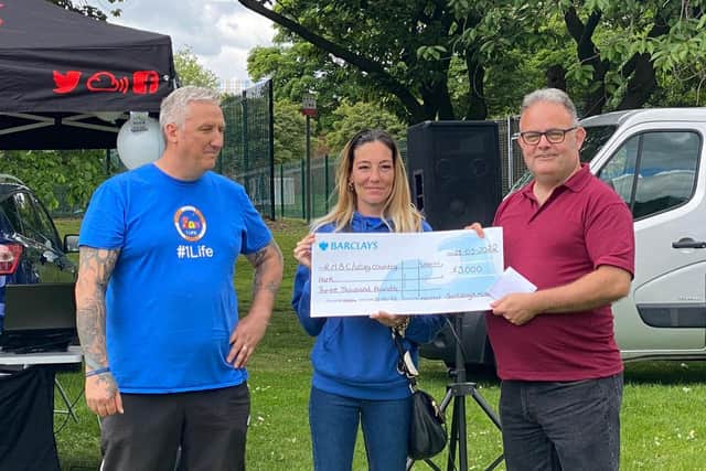 Rotherham Councillor Michael Bennett-Sylvester accepting a cheque for £3,000 from Sam’s Army Mission for life saving equipment for Rottherham Metropolitan Borough Council at Ulley. Picture taken from Councillor Michael Bennett-Sylvester Facebook page.