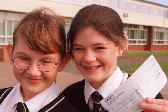 Becky Haywood, 12,  and Clare O'Connor,  13,  both from Adwick School raised more than £300 by doing a sponsored bike ride  in 1997