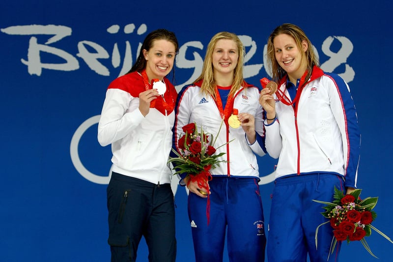 Silver medalist Katie Hoff, gold medalist Rebecca Adlington and bronze medalist Joanne Jackson of Great Britain stand on the podium during the medal ceremony for the 400m Freestyle.