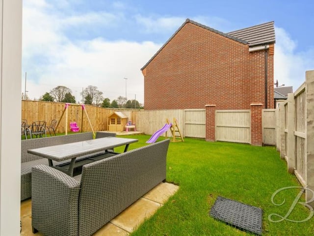 Looking out on to the back garden. As you can see, it is fully enclosed, with a surrounding fence, offering a degree of privacy.
