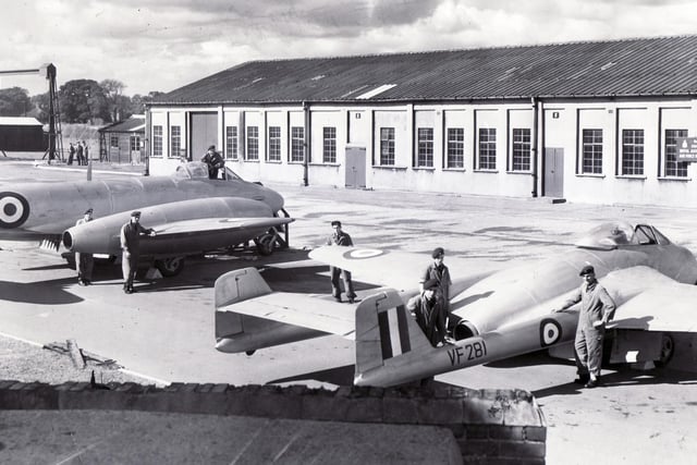 RAF Norton, Sheffield, preparing for an "At Home" day.  The two aircraft shown are a Vampire (nearest camera) and a Meteor, September 14, 1955.  The former RAF Norton Aerodrome site off Lightwood Lane, was used as a barrage balloon station during the Second World War, helping to protect the city from attacks by the Luftwaffe. The airfield closed in 1965.