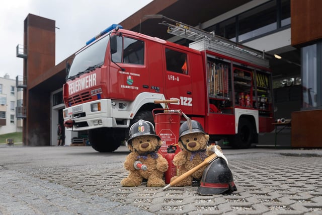 John James the teddy bear as honorary members of the local fire department in Austria. 
These adorable teddy bears could be the world's most well-travelled cuddly toys - as their photographer owner has chronicled their adventures in 27 different countries. Christian Kneidinger, 57, has been travelling with his teddy bears, named John and Bob since 2014 - and his taken them to some of the world's most famous landmarks. The teddy bears have dressed up in traditional Emirati clothing to visit the Sultan's Palace in Oman, and have braved the cold on a glacier on Lofoten Island in Norway.