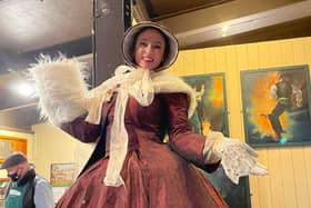 A Victorian Lady on stilts is just one of the attractions at Kelham Island Museum's Victorian Christmas market. Photo by Jinqian Li