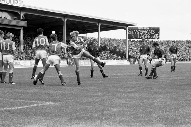 Hibs' Steve Archibald, Eddie May (no 7) and John Collins (no 10) during the Hibs v Hearts Edinburgh derby at Easter Road in August 1988. Final score 0-0 draw.