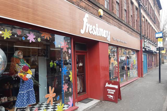 Freshmans vintage store in Sheffield city centre. Window artwork by Lass Who Paints Glass