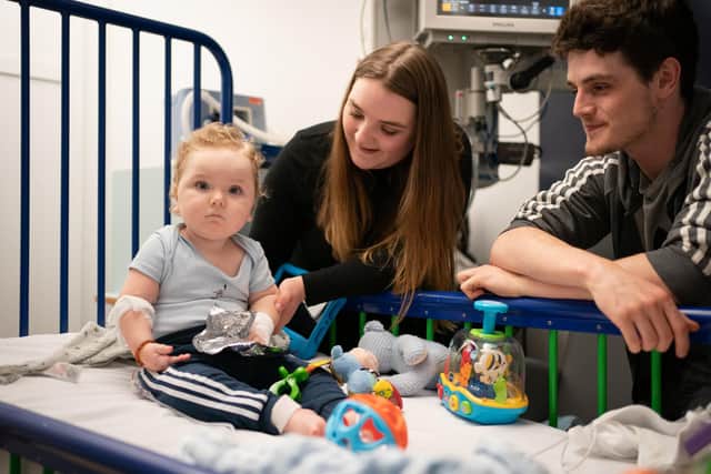 Rosie-Mae Walton and Wes Powell with their son Marley as he recovers at Sheffield Children's Hospital having received the "most expensive drug in the world", the genetic treatment Zolgensma.