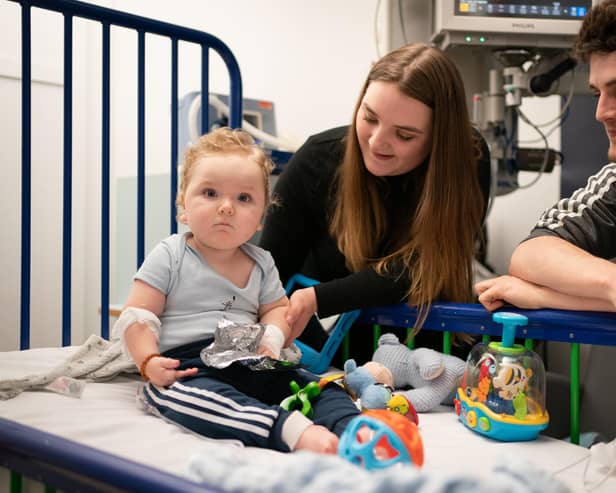 Rosie-Mae Walton and Wes Powell with their son Marley as he recovers at Sheffield Children's Hospital having received the "most expensive drug in the world", the genetic treatment Zolgensma.