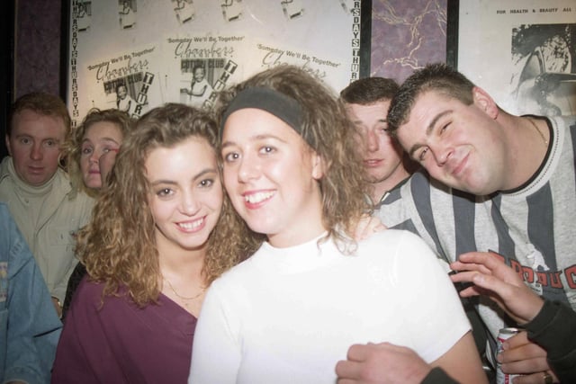 Perhaps the hairstyles will help you guess the year. Here are some friends on a night out to Chambers.