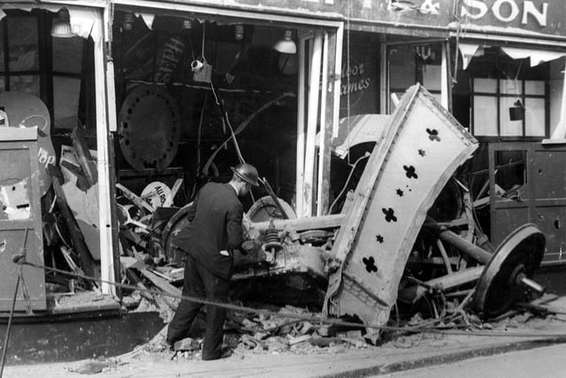In 1940, a German air raid bomb blew a railway truck from the nearby station into the front window of the Joseph's store. Yet somehow, the store kept going.