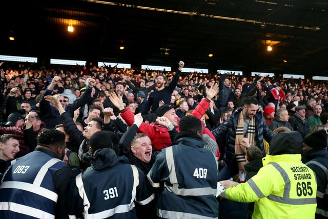 United fans celebrate their side's 1-0 win over Crystal Palace at Selhurst Park last February.