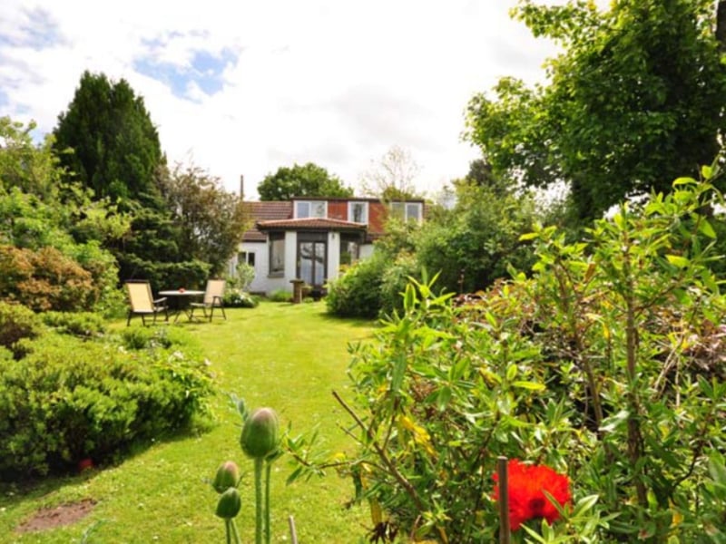 This redesigned cottage looks like it came straight out of a painting. The detached cottage is situated in a tiny hamlet near Dalcross, which is 20 minutes drive from Inverness.