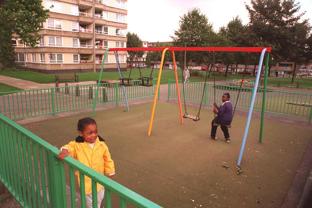 Children play in the playground at Exeter Drive, Sheffield in 1997