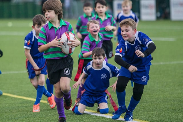 Isaac Brown on the ball for Wilton Primary during last Friday's youth rugby festival at Hawick's Volunteer Park