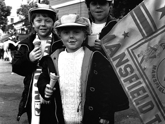 Fancy hats, Mansfield Town flag and an ice cream each. Guess the Stags must have won at Wembley.