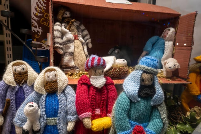 A knitted nativity at Oxfam.