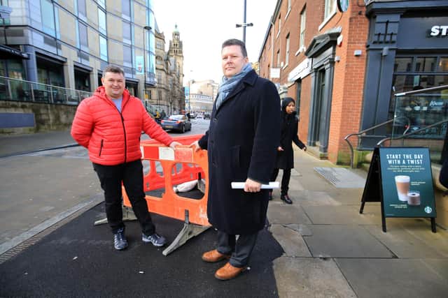 Surrey Street works in March. Mick Crofts, director of business strategy and regulations at Sheffield City Council, right, and Coun Mark Jones, cabinet member for street scene and the environment.